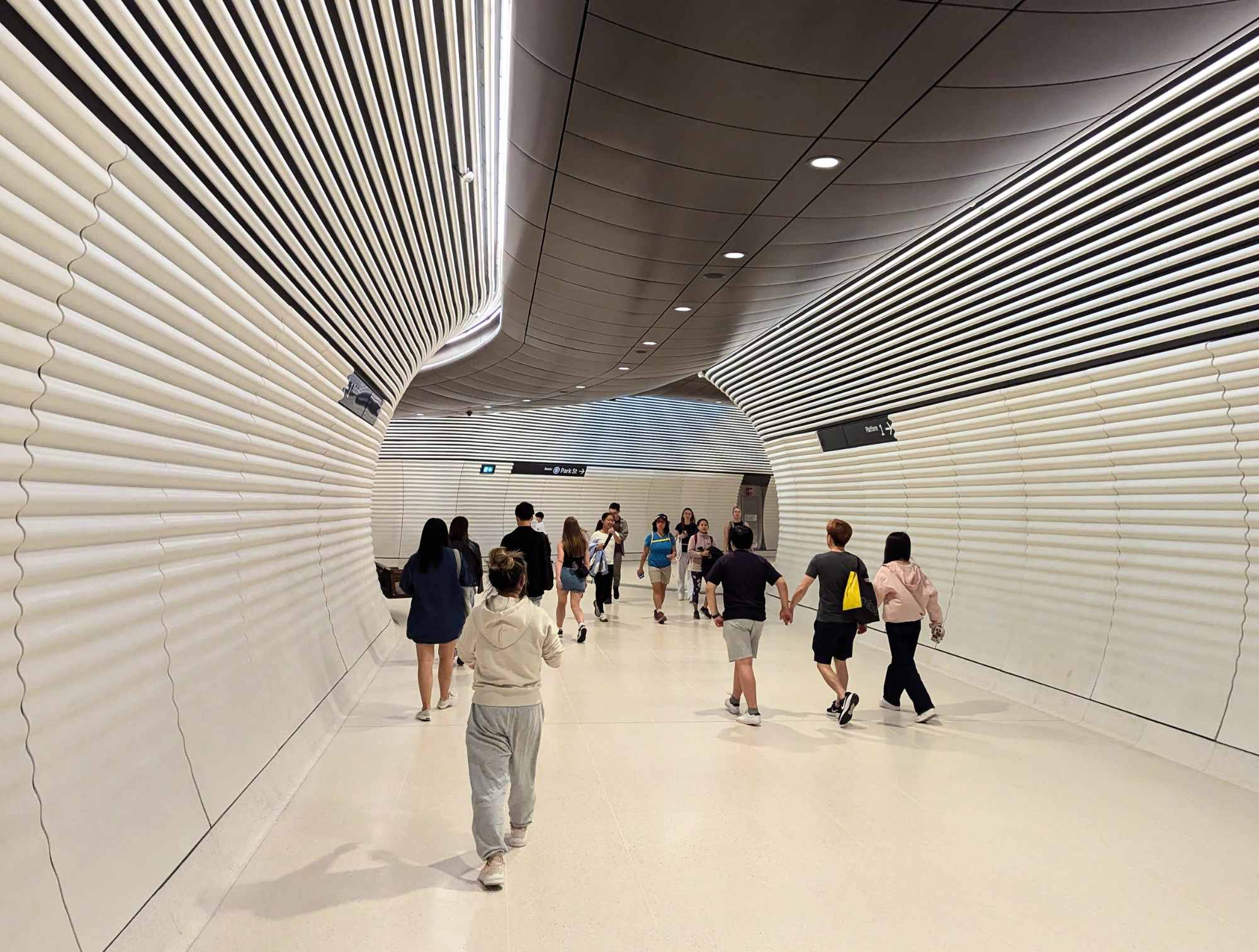 white, futuristic interior inside Gadigal Metro station Sydney